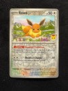074 Eevee [Pokemon Day] Prismatic Evolutions Common NM