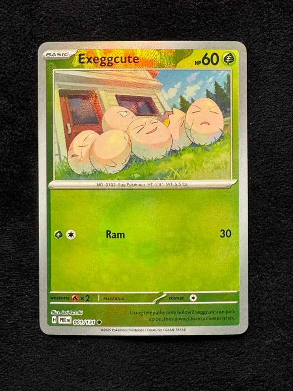 001 Exeggcute [Poke Ball] Prismatic Evolutions Common Near Mint