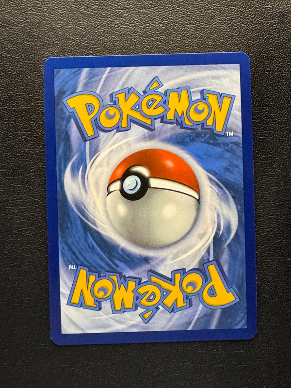 099 Black Belt's Training [Poke Ball] Prismatic Evolutions Common Near Mint